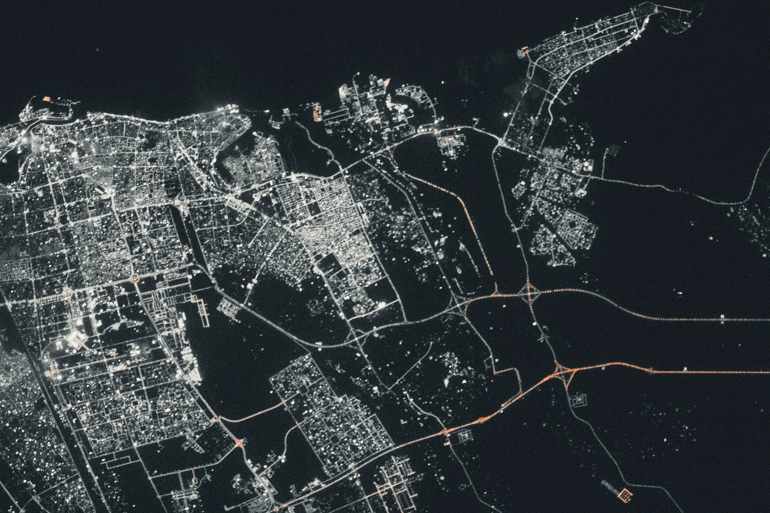 City lights at night, photographed from the International Space Station