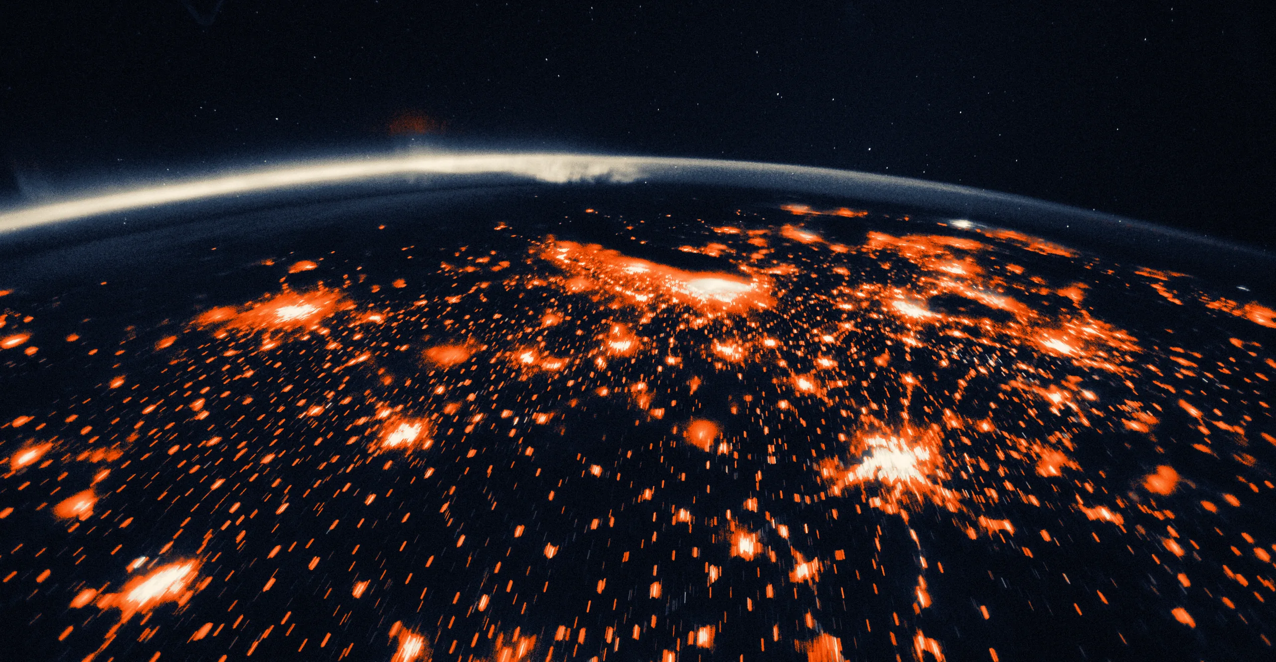 Aurora Borealis and city lights on the horizon taken by the Expedition 29 crew