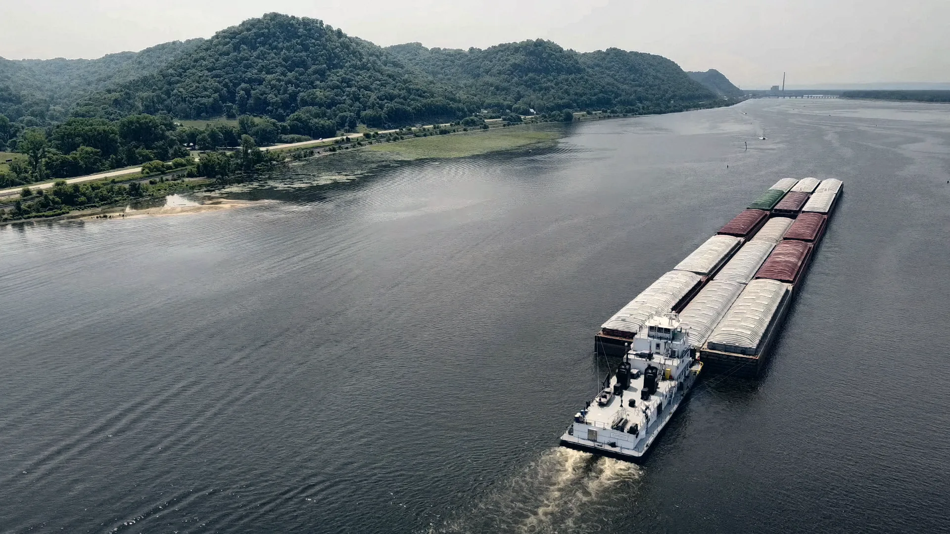 A towboat pushing barges on the Mississippi