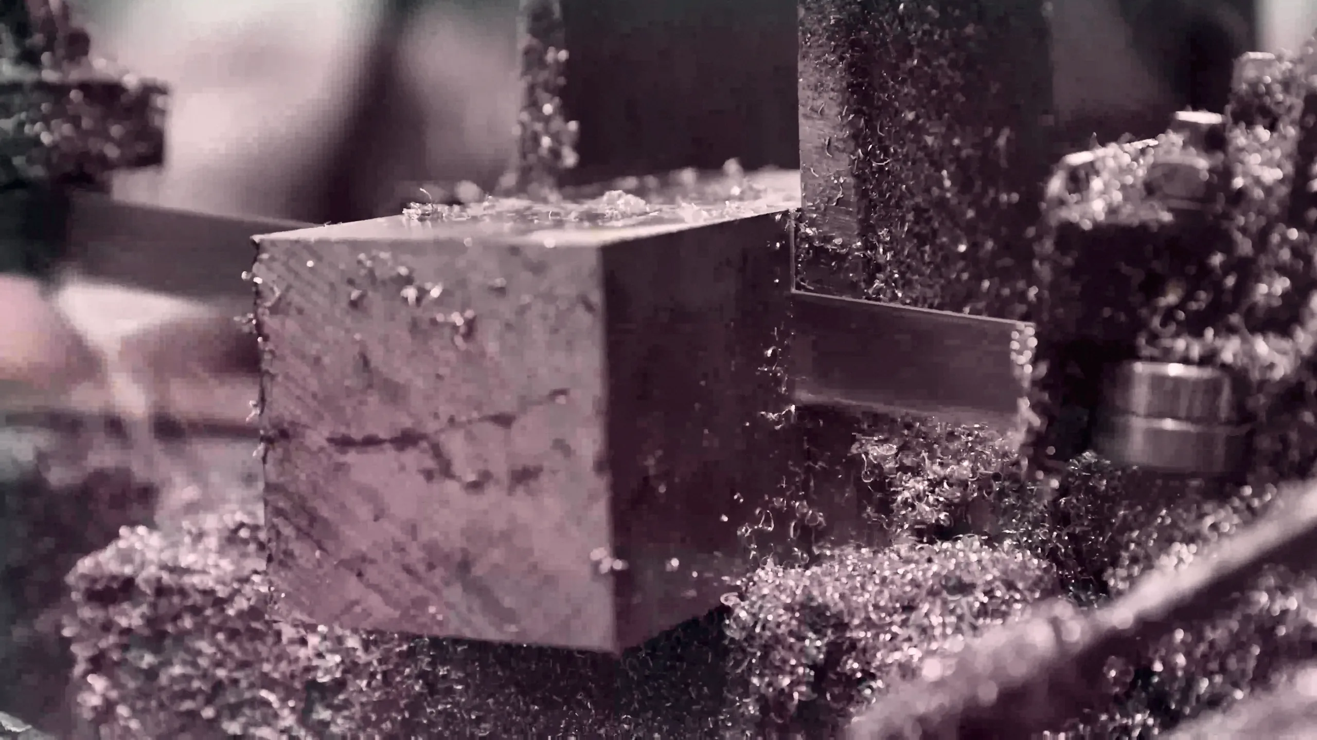 An aluminium block being milled — NASA machine shop