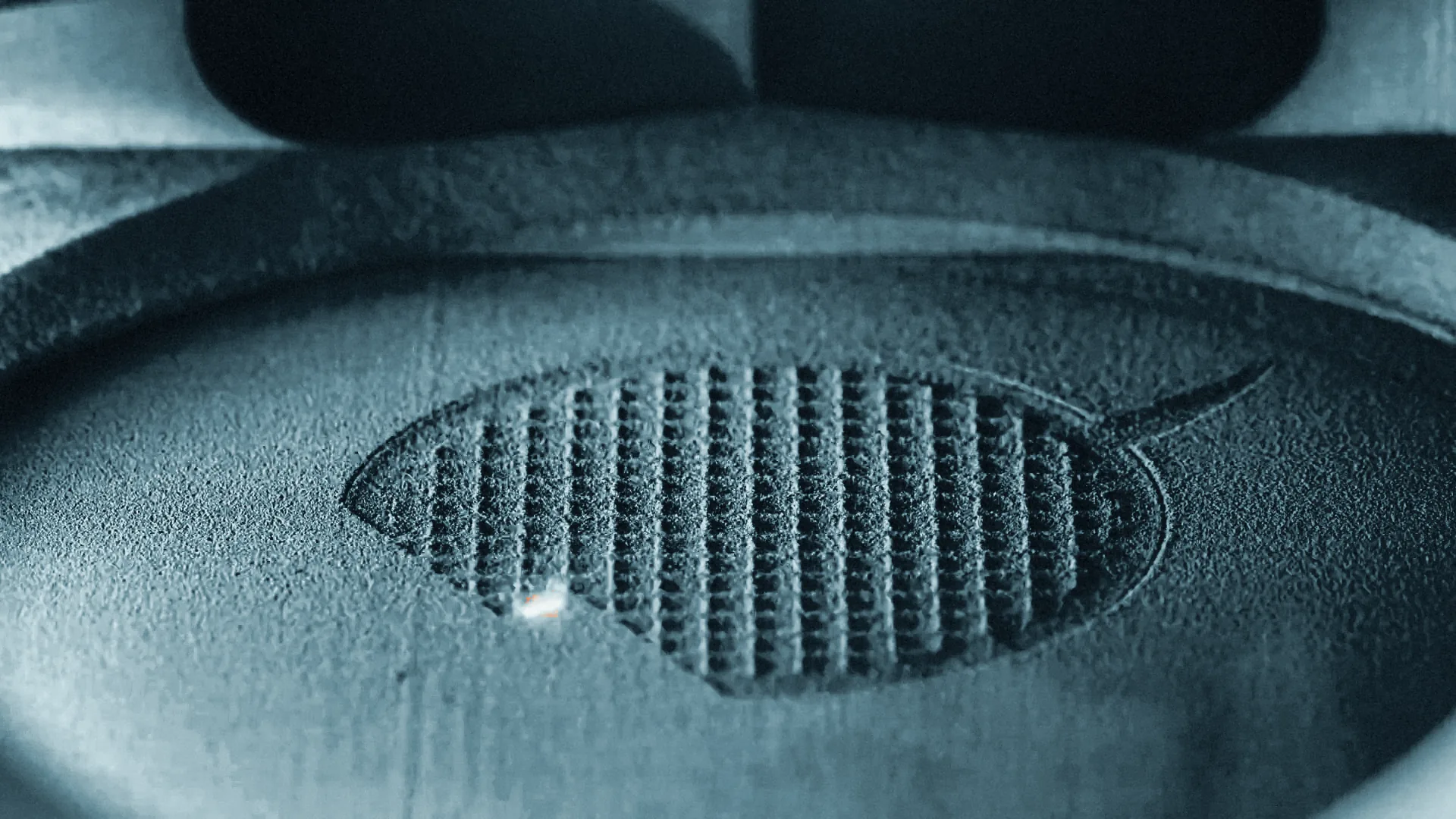 A laser fusing metal powder — NASA, 3D printing of GRX-810 (2023)