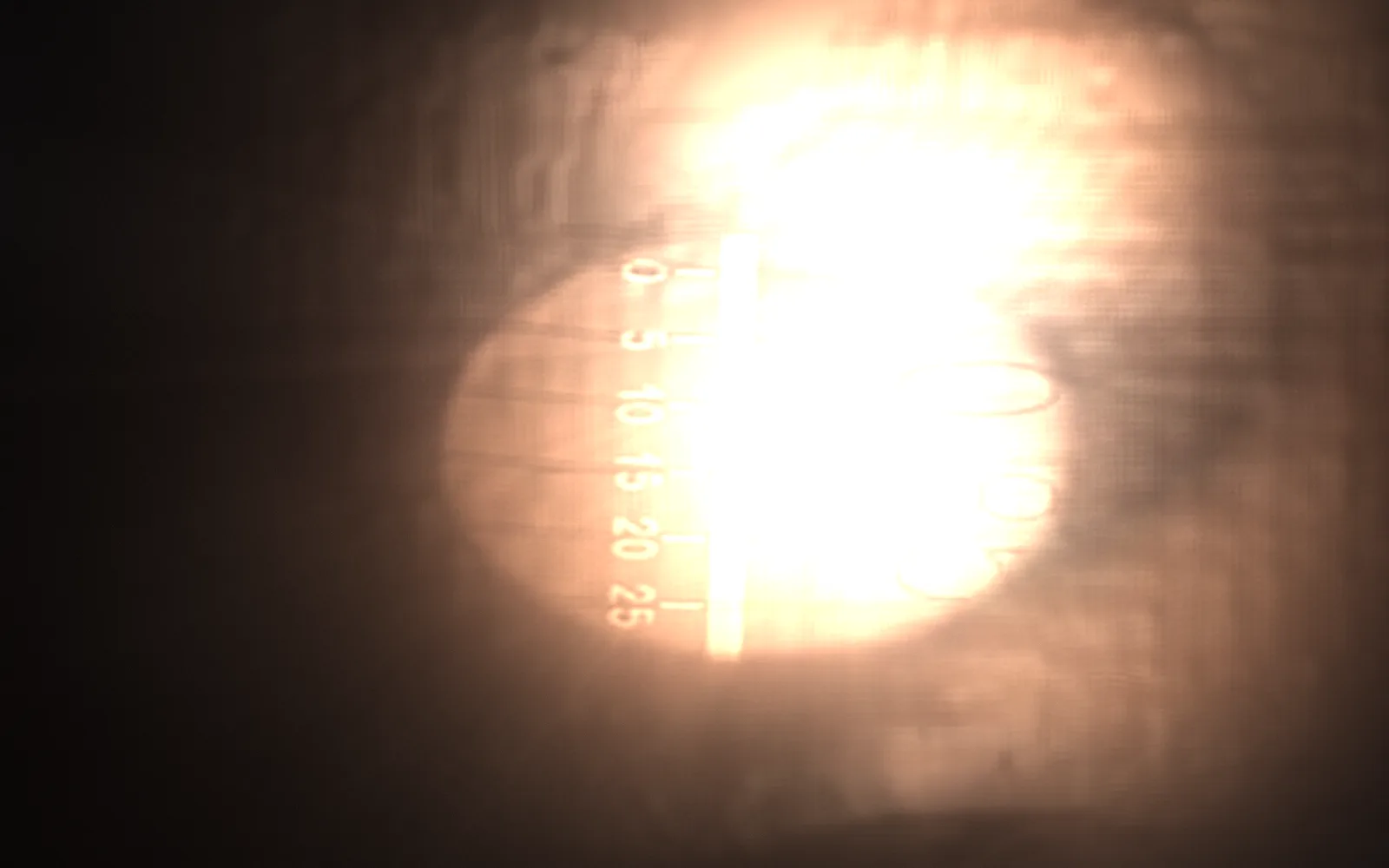 A measurement, read — Precisely So, 1937; the film lit again by a moving light, the rest in shadow