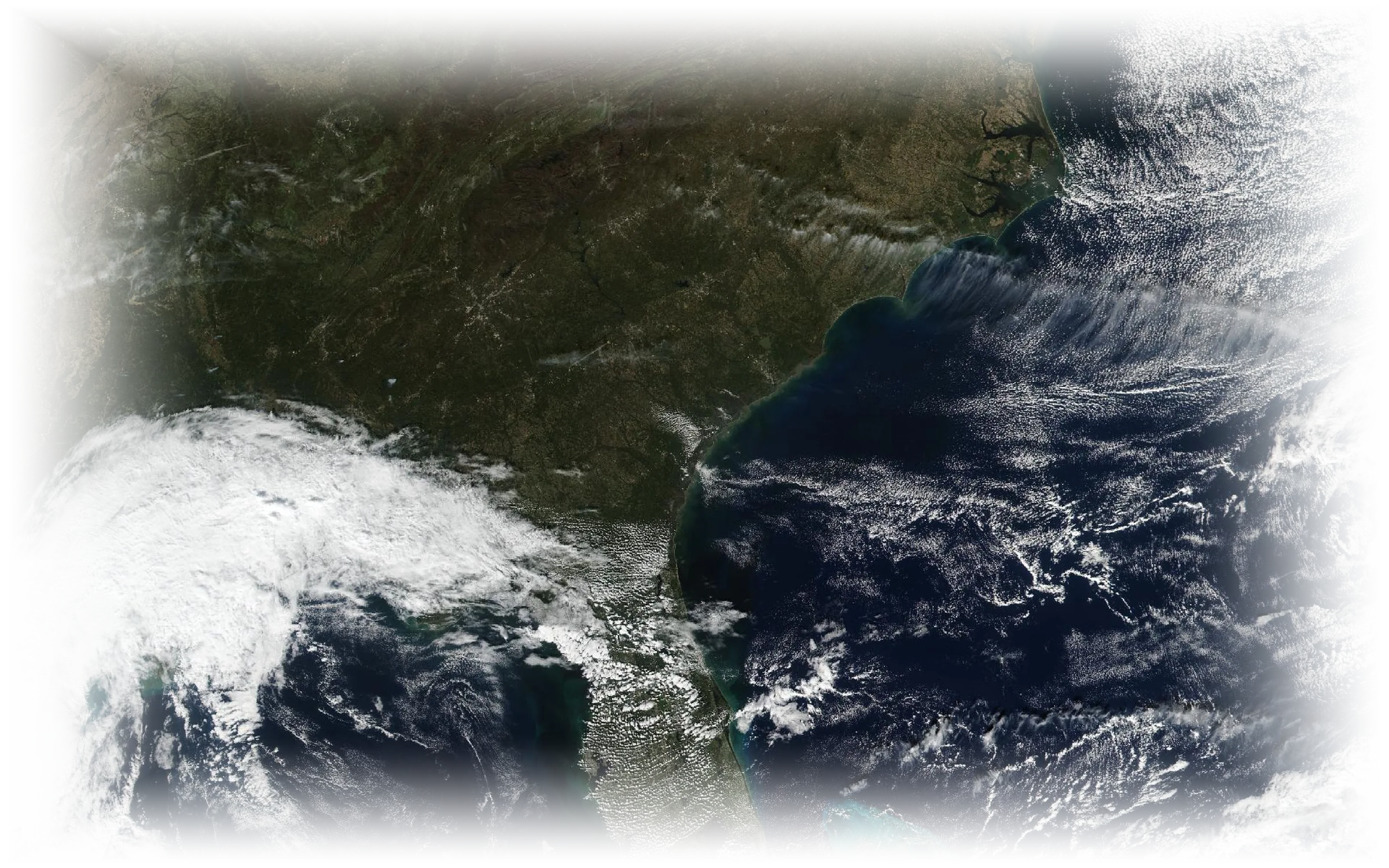 The U.S. Southeast, the same day — field of view 2,000 km. NASA VIIRS via GIBS · 12 November 2024
