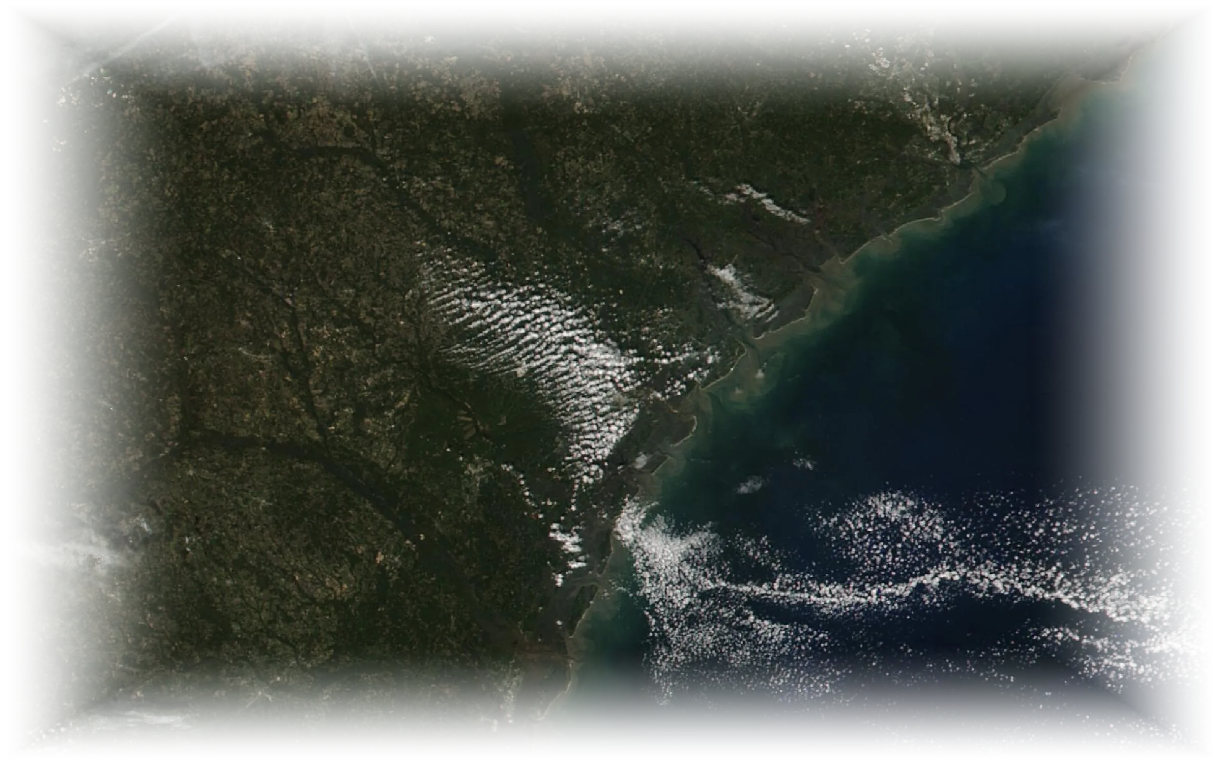 A coastline — field of view 400 km. NASA VIIRS via GIBS · 12 November 2024